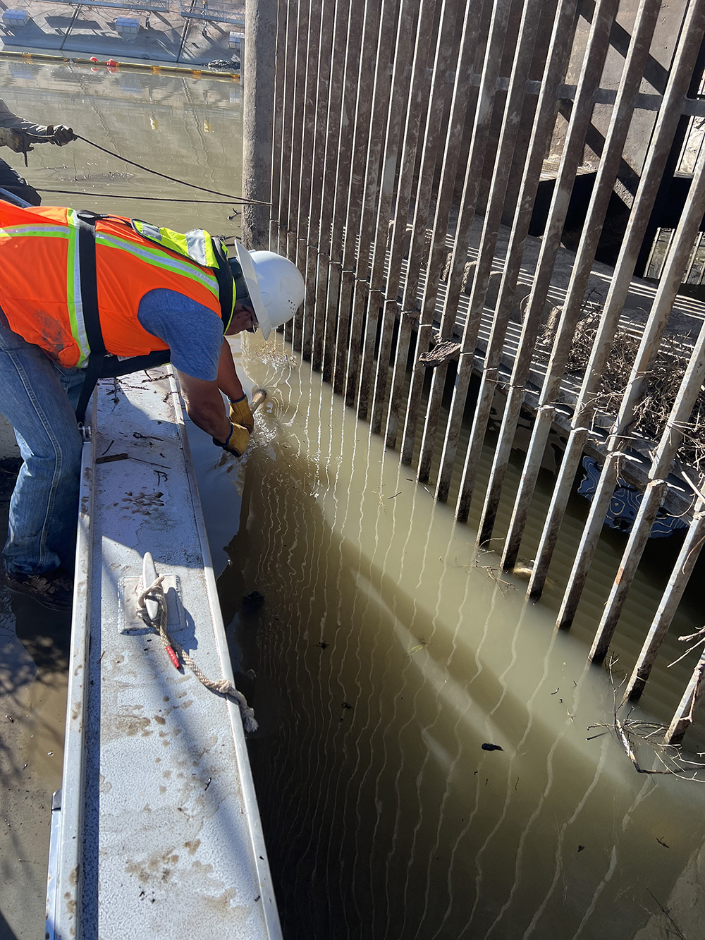 Cleaning debris in El Vado Dam’s outlet works